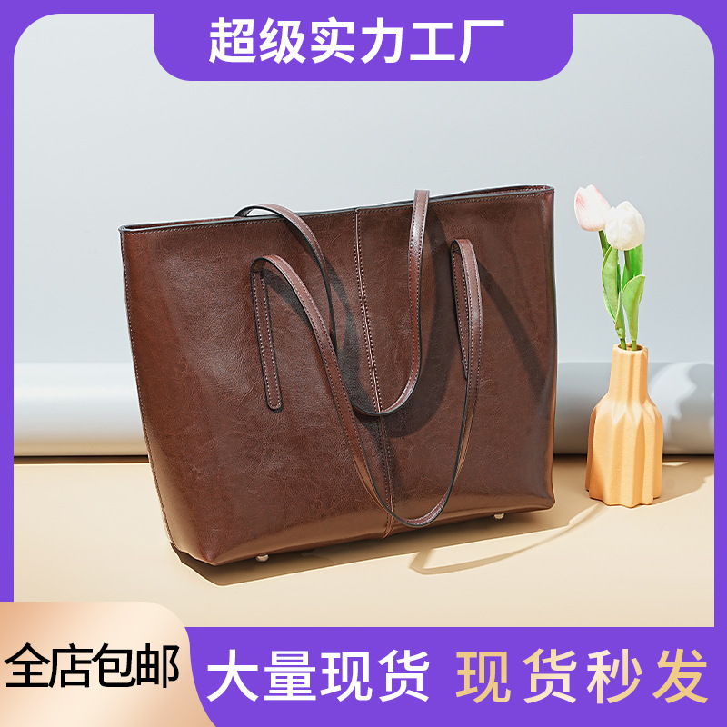 대형 가방 휴대용 가죽 어깨 가방 여성용 Cowhide 틈새 디자인 대용량 여성용 통근 하이 엔드 토트 백