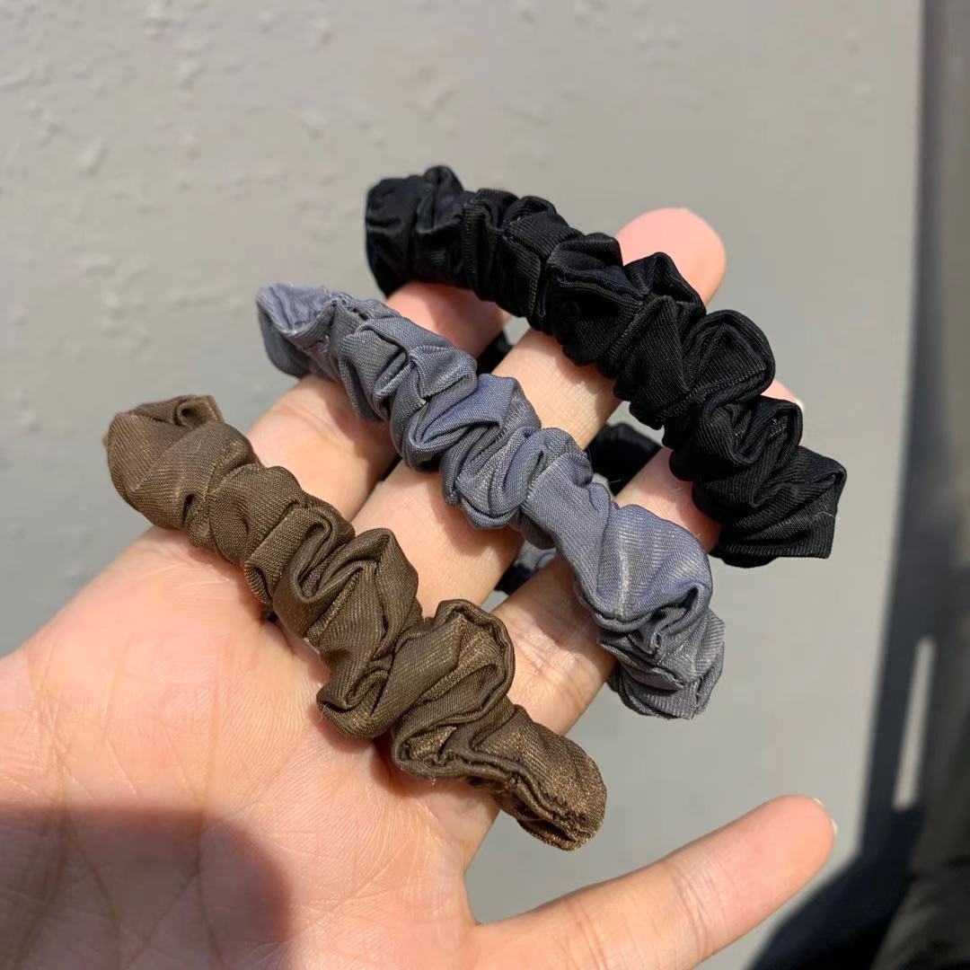 Corea del Sur Dongdaemun mismo estilo colorido intestino grueso pelo banda satén bolas cabeza cuerda ins chica plisada banda de goma accesorios para el cabello cuerda