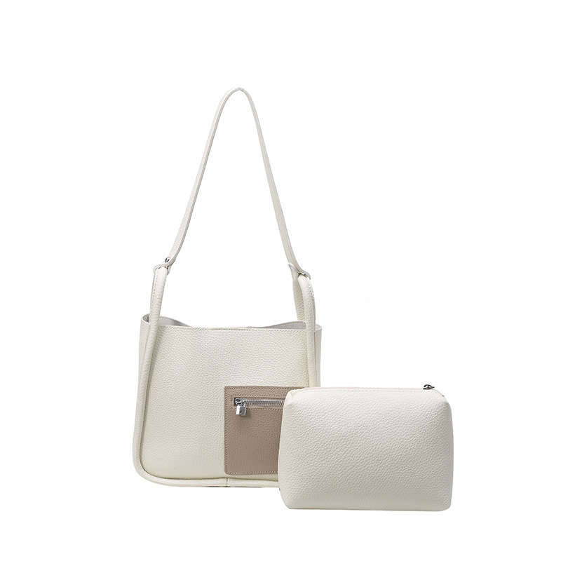 Bolso de axila popular de este año 2025 verano nuevo bolso femenino moda patrón de lichi bolso de hombro de color de contraste