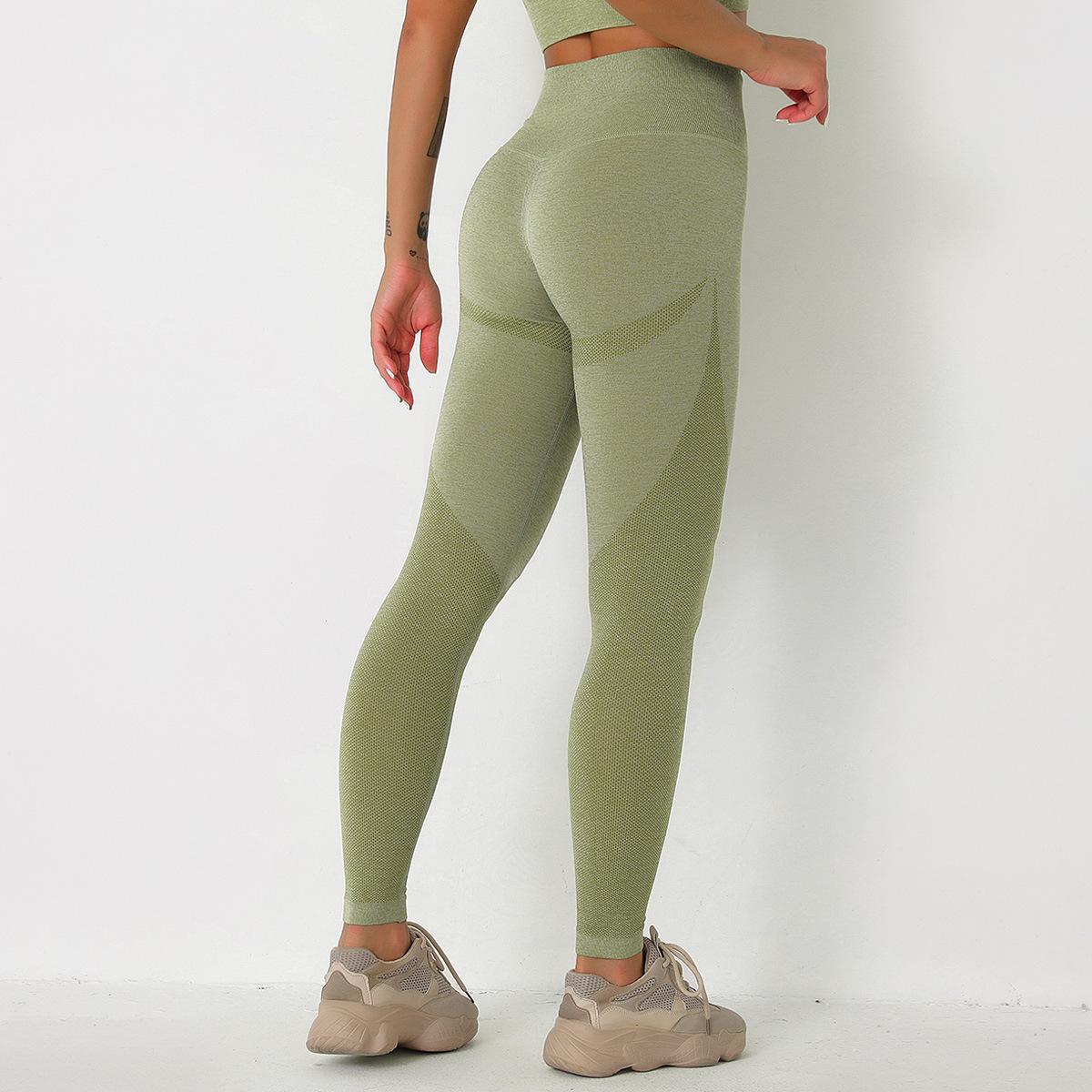 Pantalones deportivos de tejido sin costuras que absorben la humedad NSLX48965