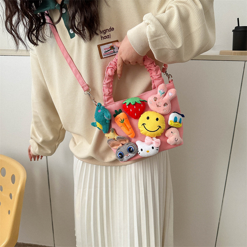 Bolsa de dibujos animados 2023 Mori linda chica fea Linda costura muñeca estilo occidental plisado bolso de hombro portátil