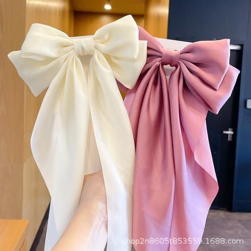 El temperamento de la cinta de lazo súper grande tiene un sentido avanzado. la nueva versión coreana de la decoración del cabello rojo de la red tiene una gran pinza de resorte de color sólido de satén al por mayor.