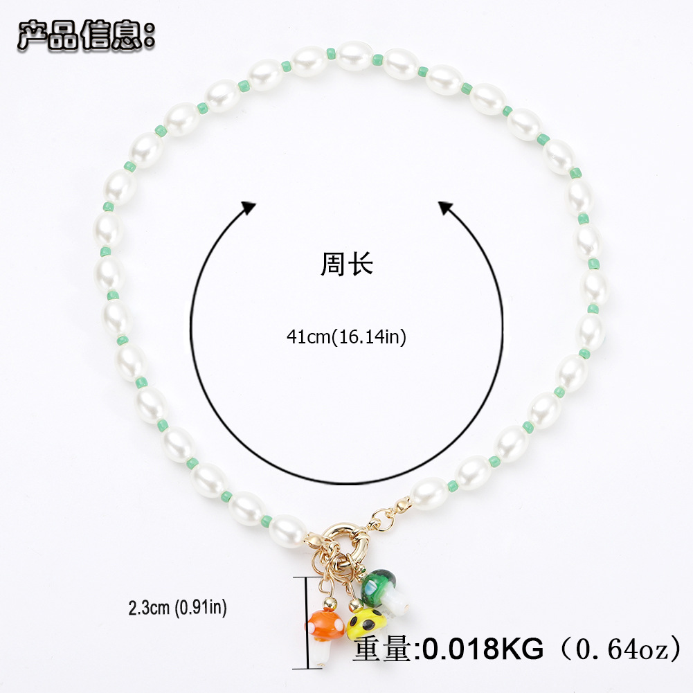 Cross-border Hot Selling Baroque Style Large Particle Pearl Necklace Korean Fashion Cute Colored Glaze Mushroom Pendant Sweater Chain display picture 1