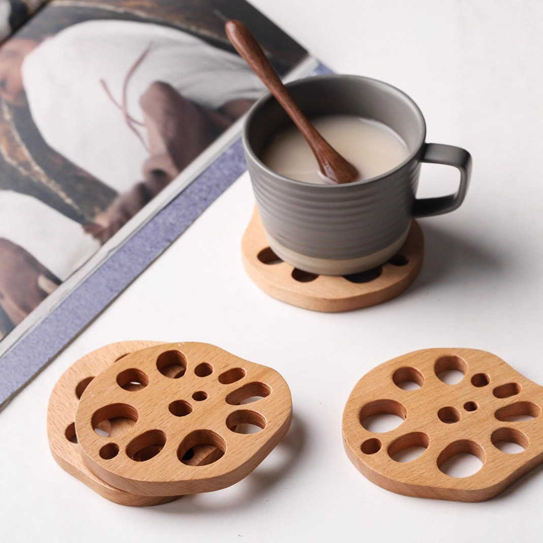 En stock creativo taza estera de madera de aislamiento de kung fu taza de té titular de la raíz de loto de haya pieza de montaña estufa hirviendo taza de té estera