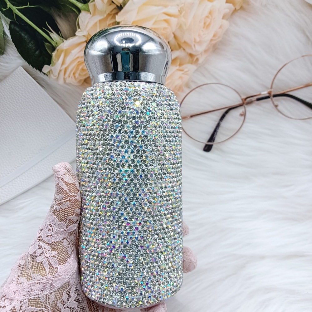 흰색 보온병 컵