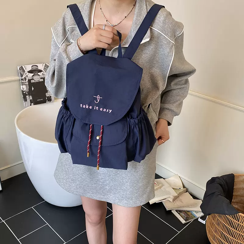 韩国帆布双肩包包女2025新款潮时尚学院风背包休闲大容量书包布包