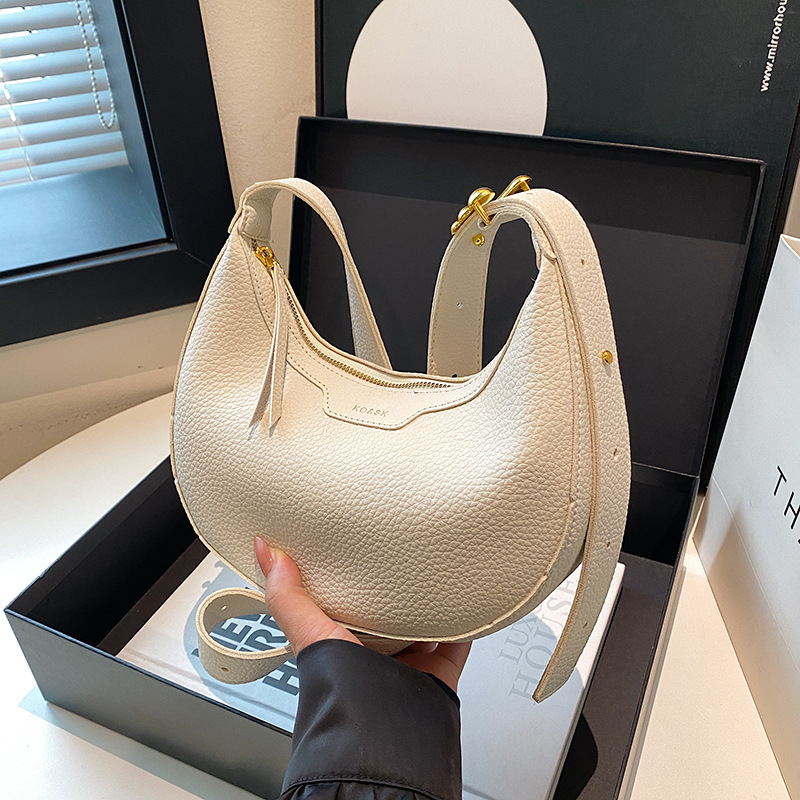Bolso de bola de masa de nicho transfronterizo bolso de mujer 2025 nuevo bolso de hombro de viajero de moda retro bolso de mensajero de mujer