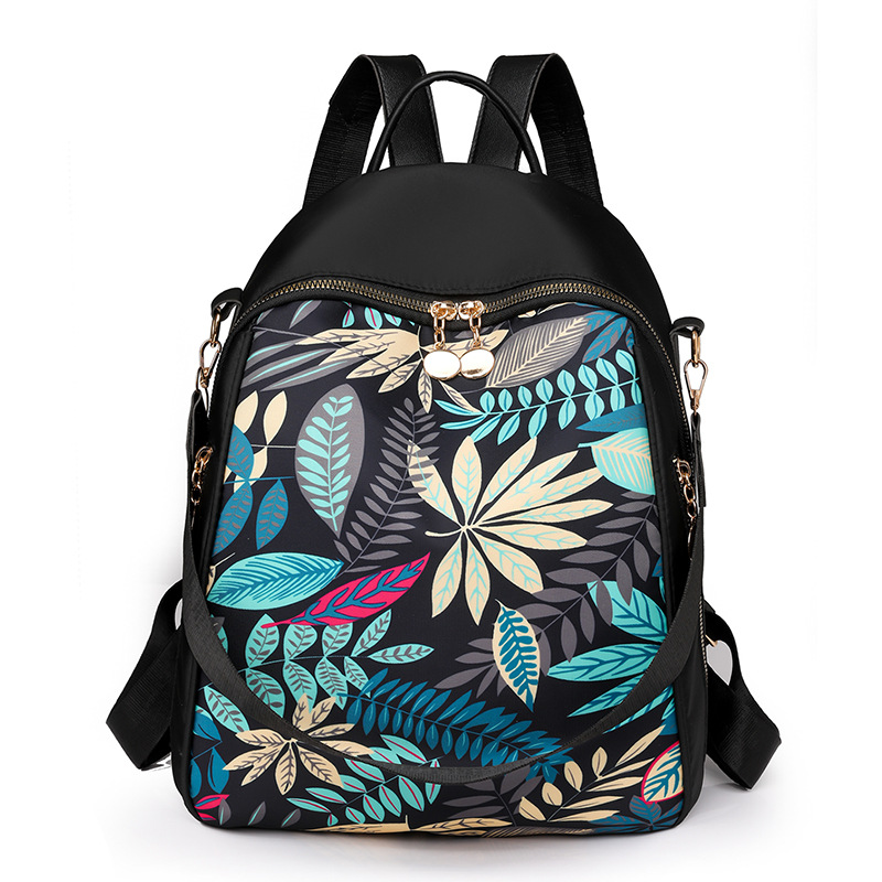 Bolsos para mujer 2023 nueva mochila de nylon para mujer coreana moda salvaje color de contraste mochila de viaje al aire libre al por mayor