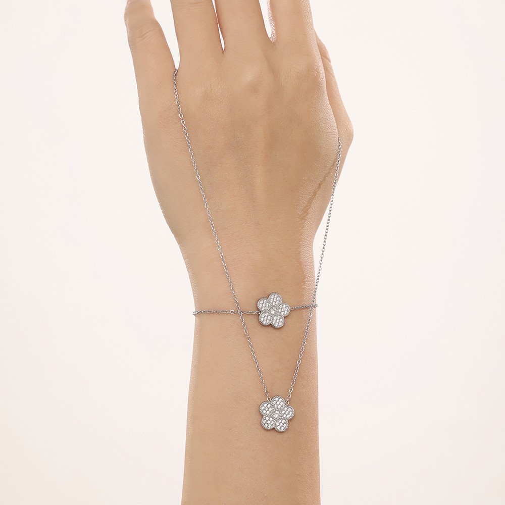 Flores de ciruela incrustadas de zircón superbrillo de diamante de lujo temperamento collar pulsera de acero inoxidable Dongguan conjunto de joyas mujeres