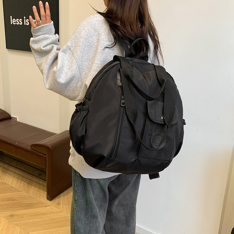 2024 otoño y invierno nuevo estilo bien sensación de alta calidad compacta simple versátil gran capacidad viaje de negocios mochila de hombro