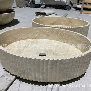 兴燕定制天然米黄洞石台上盆 竖纹雕刻圆形石盆 浴室洗手盆