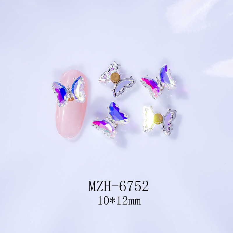 Giratoria de uñas mariposa joyería en línea celebridad tridimensional Rosa cristal alas accesorios DIY mariposa joyería de uñas Taladro