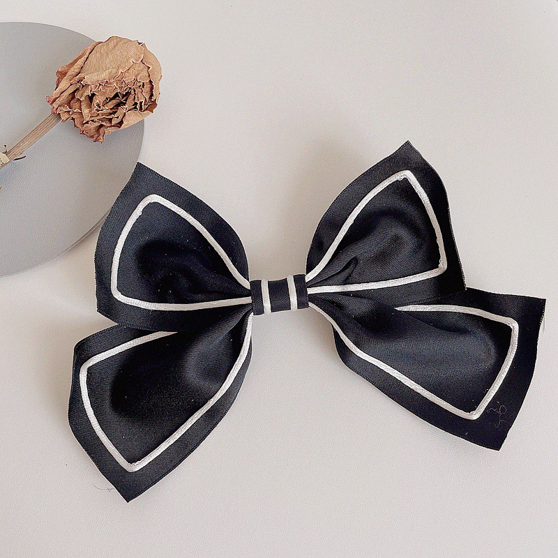 Fashion Retro Bow Simple Contrast Color Hairpin display picture 2
