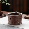 Brown four elephant alcohol stove