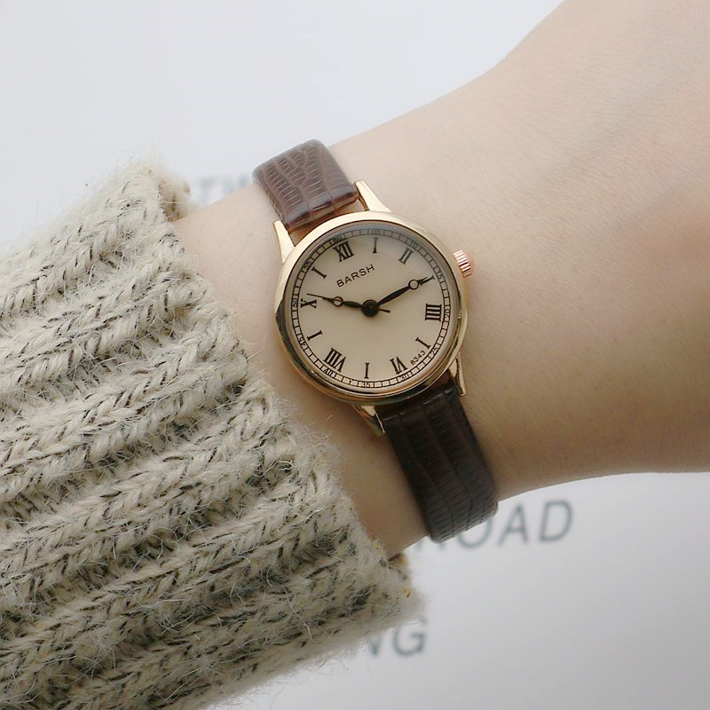 Boys and girls small plate thin belt watch Roman scale small 202 watch Mori style primary and secondary school student quartz watch 7634