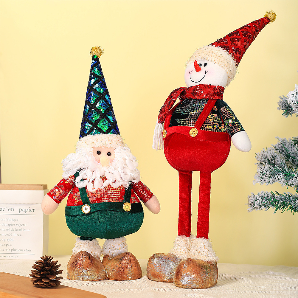 Cross-border Santa Claus muñeco de nieve alce adorno pierna retráctil muñeca ventana de Navidad decoración del hogar regalo