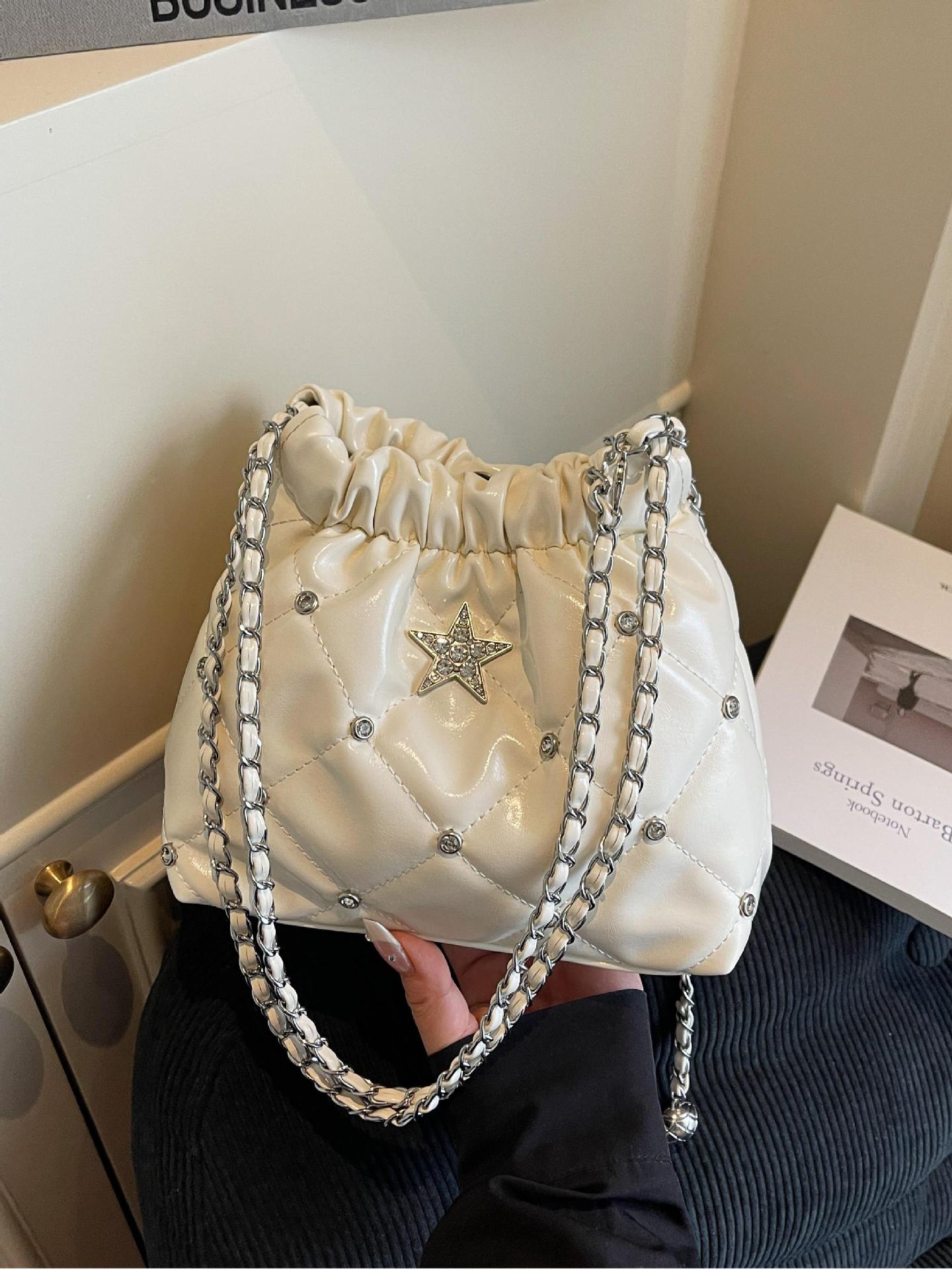 Bolso de cadena de rombos de fragancia pequeña transfronteriza para mujer 2025 nuevo estilo estilo occidental bolso de hombro de viajero salvaje bolso de cubo de mensajero