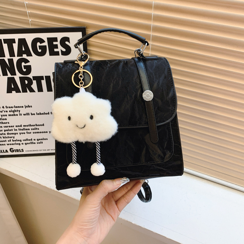 Mochila pequeña 2024 nuevo estilo de diseño de moda nicho de viaje bolsas escolares ligeras para mujeres ins para salir mochila pequeña