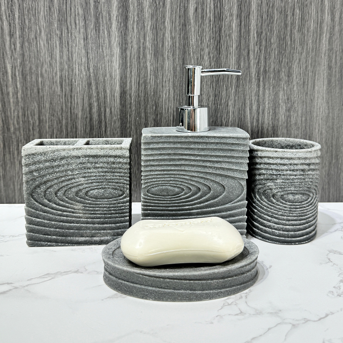 Juego de cuatro piezas de arena gris