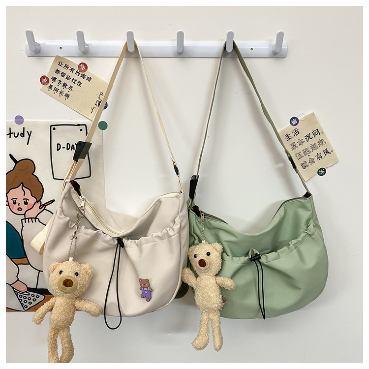 The new 2022 Little Bear canvas small bag for women is simple and versatile. The student dumpling bag is a trendy casual single-shoulder crossbody bag undefined