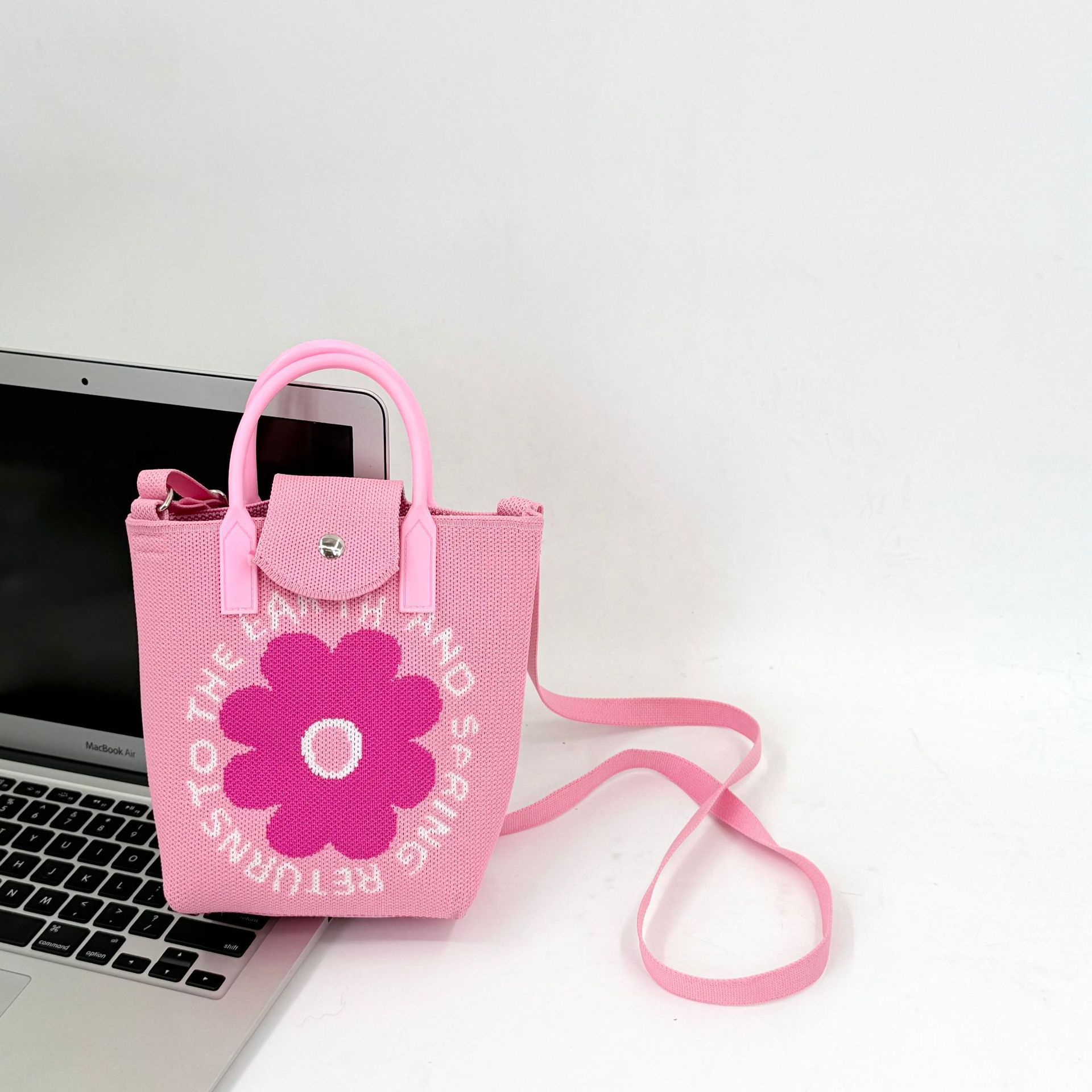 Fuchsia bag solar-powered