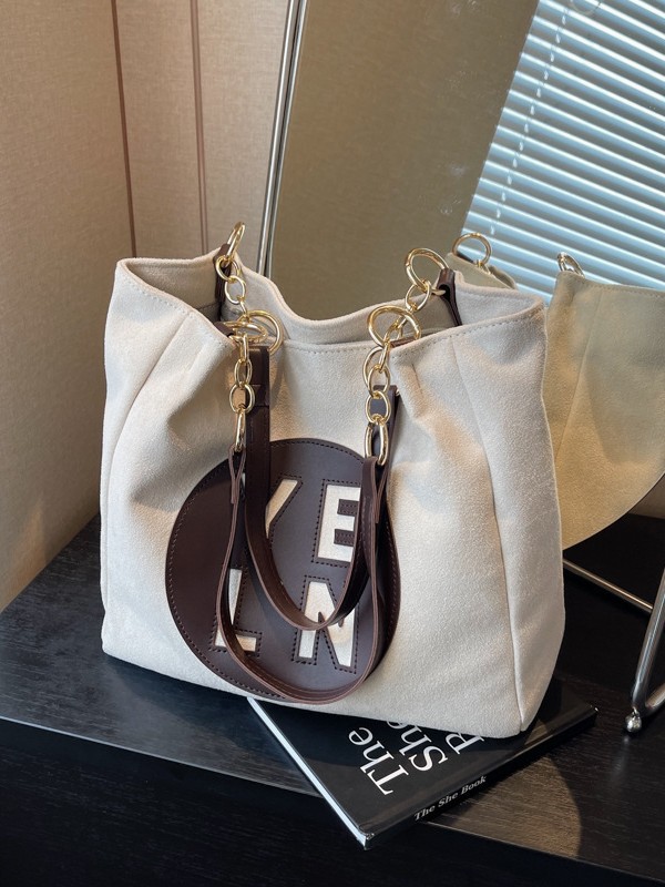 Bolso de gran capacidad para mujeres 2024 nuevo otoño y invierno de moda letras de colisión de color bolso de hombro universal bolso de clase