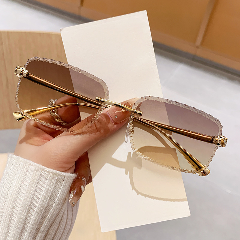 欧美墨镜新款设计感无框豹子头男士太阳镜驾驶防晒时尚金属眼镜