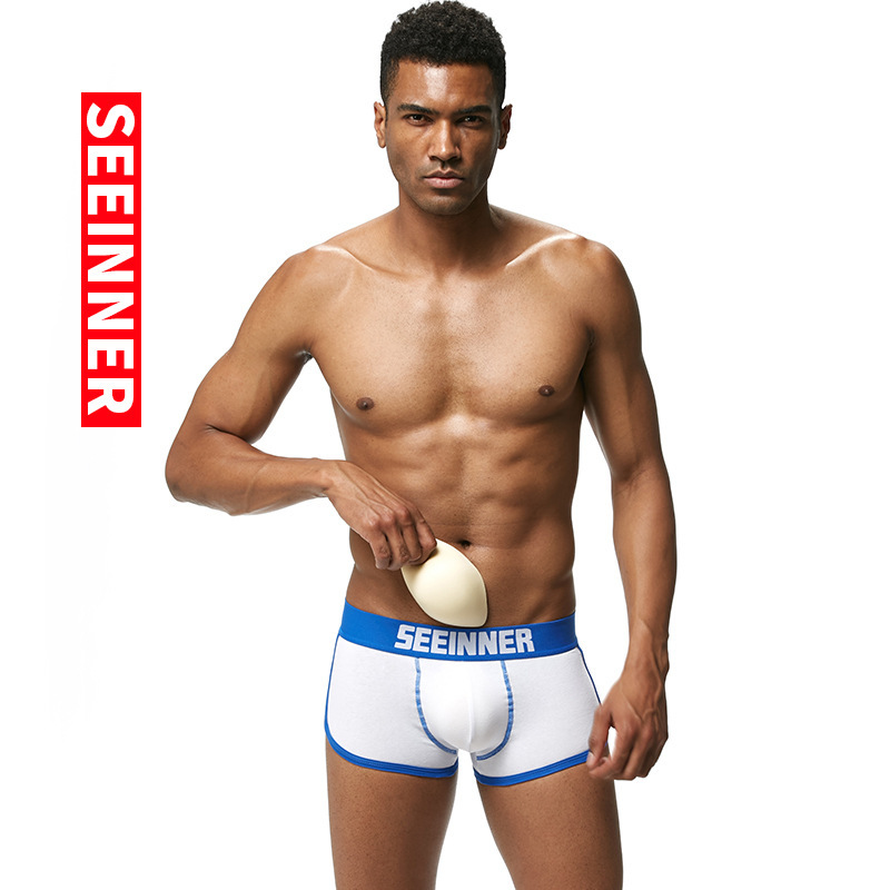 Ropa interior masculina para exportación en AliExpress y Amazon, calzoncillos bóxer de algodón con relleno en la cadera, color liso, nuevo diseño transpirable que realza la cadera.