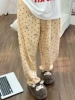 Champagne-colored polka dot cat (straight)