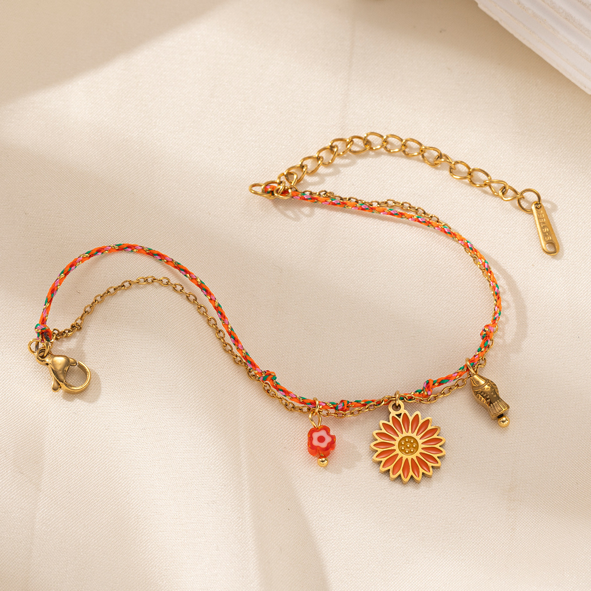 TENA Europa y América pulsera de acero inoxidable lujo ligero nicho flores mariposa colgante pulsera de acero de aluminio joyas de mano calientes transfronterizas