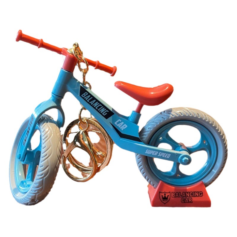 Diversión creativa diversión móvil deslizante bicicleta llavero pareja coche moda fresco adornos pequeños regalos al por mayor
