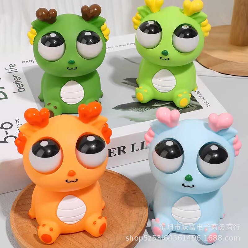 Creative eye-popping dragon pinch music decompression toy Internet-famous explosion dragon year squeeze eye-popping little dragon doll vent toy