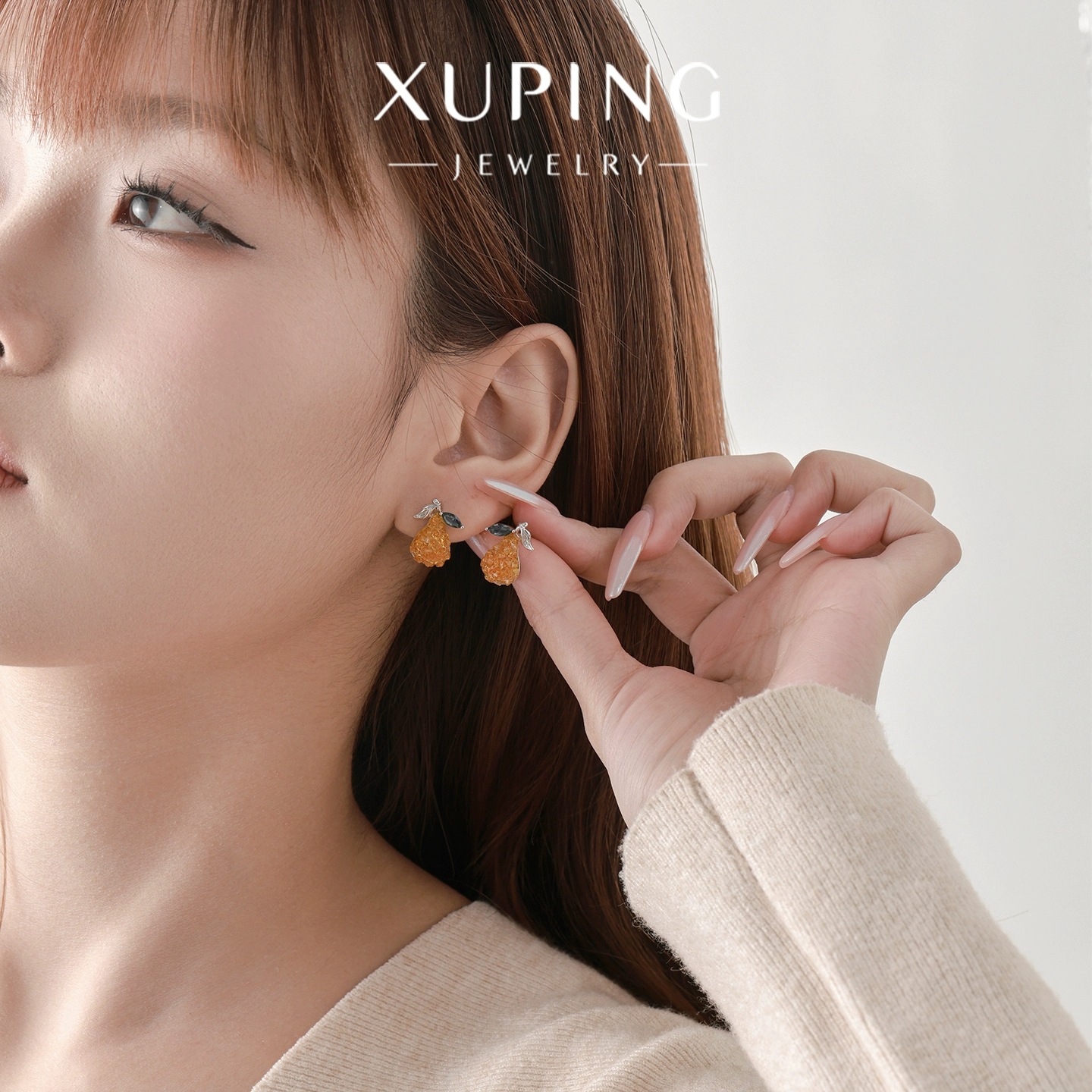 Xuping pequeño fresco lindo estilo de frutas pernos nicho japonés y coreano color Bao serie transparente pera otoño invierno orejas