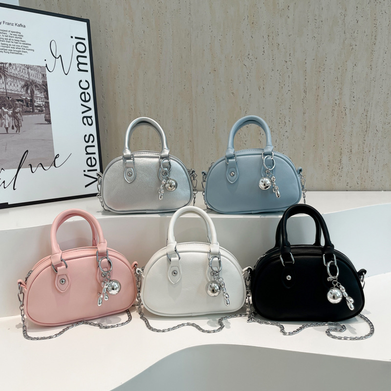 2024 nuevo temperamento diseño de moda bolso de hombro de color sólido estilo retro cremallera concha textura mochila