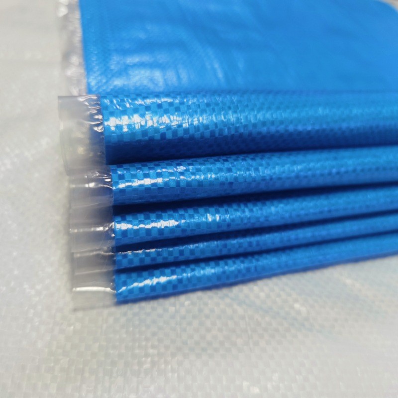 Bolsas tejidas azules, bolsas de piel de serpiente, bolsas de embalaje para logística de entrega urgente, bolsas de grano de maíz engrosadas, sacos de arpillera al por mayor.