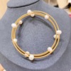 Organic bracelet from pearl, 14 carat