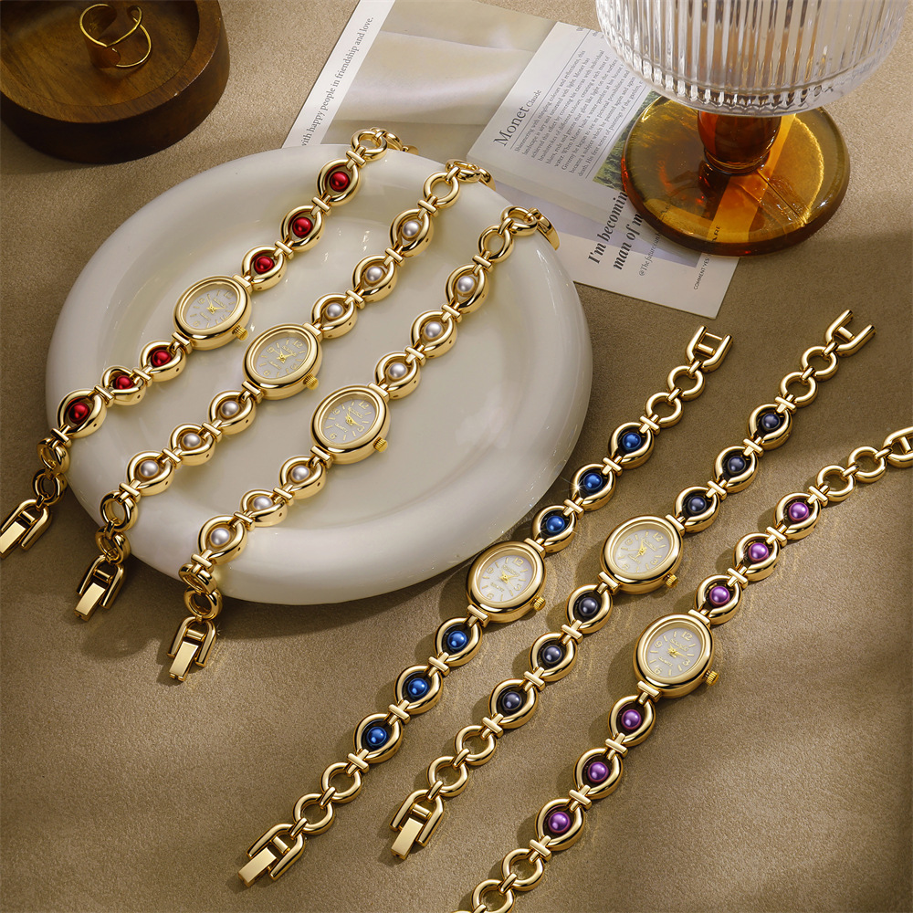 Cross-border colorful pearl inlaid women's bracelet watch, high-end metal chain, niche light luxury women's quartz wristwatch