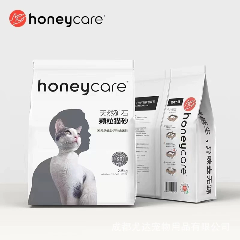 Котячий наполнитель (Honeycare) натуральные бентонитовые гранулы с активированным углем, прочная слеплямость, 2,5 кг