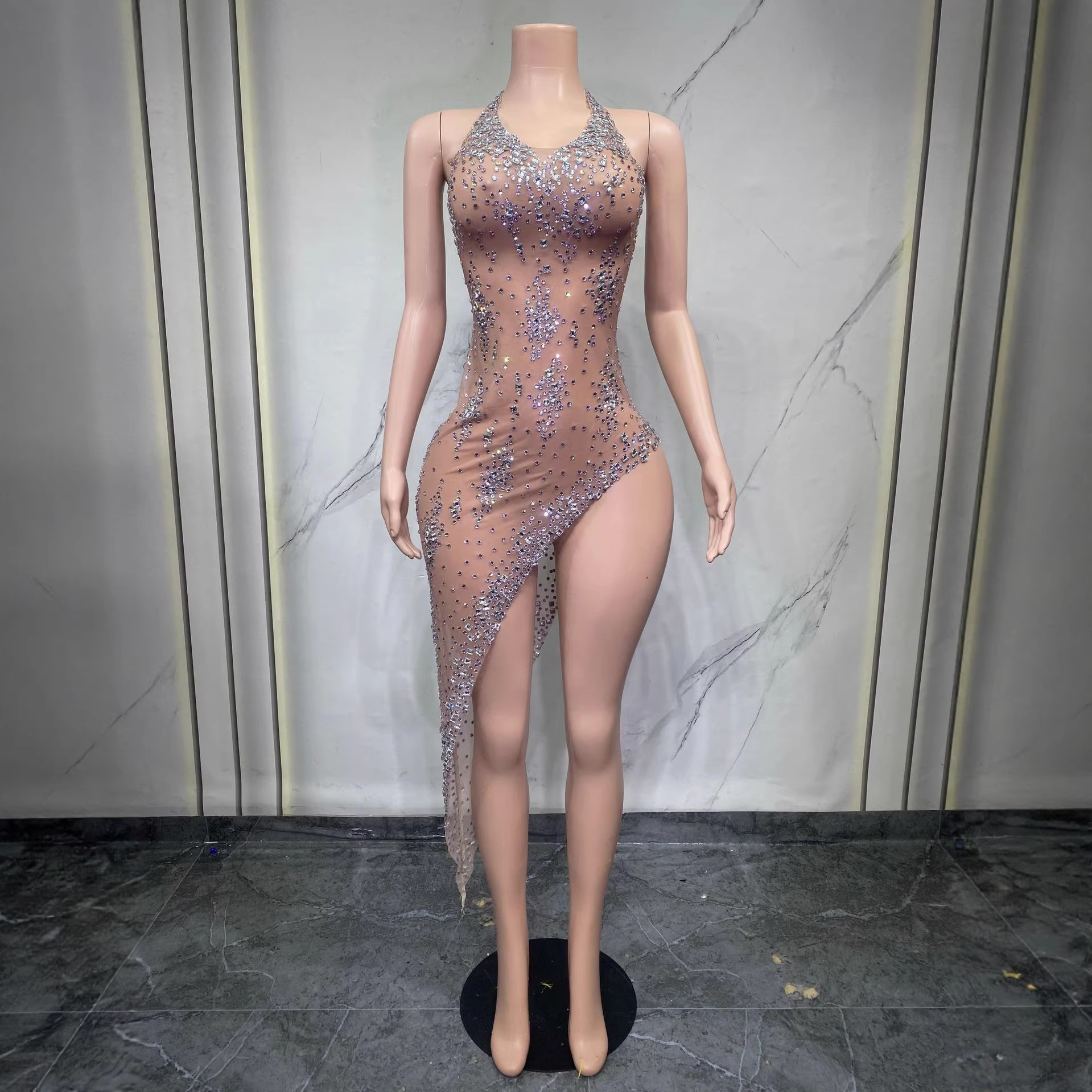 Elegant sparkling rhinestone halter neck backless dress with irregular hemline, suitable for cocktail parties, evening events, and performances