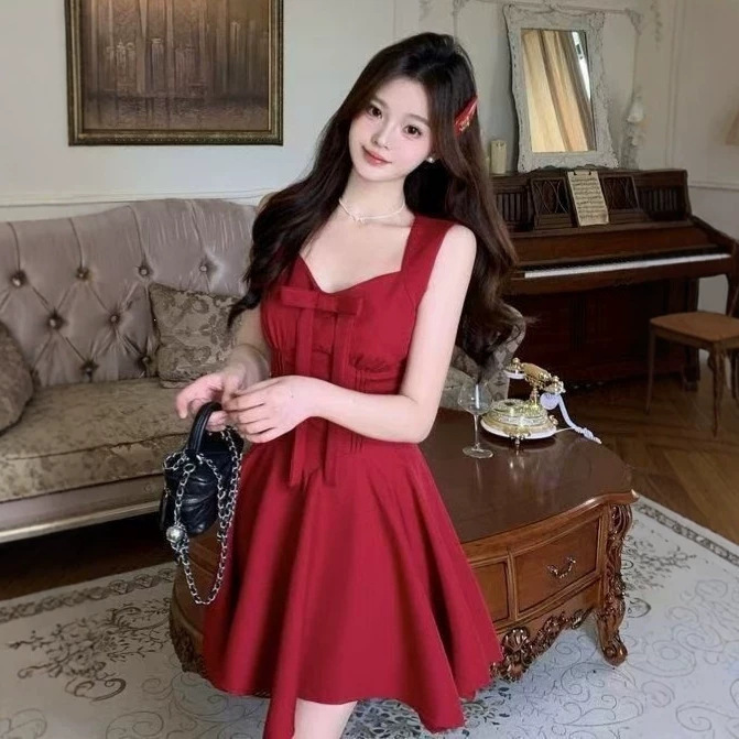 French-style elegant bow-tie strap dress for women, high-end, waist-cinching, stylish red pleated short dress for summer French-style elegant bow-tie strap dress for women, high-end, waist-cinching, stylish red pleated short dress for summer