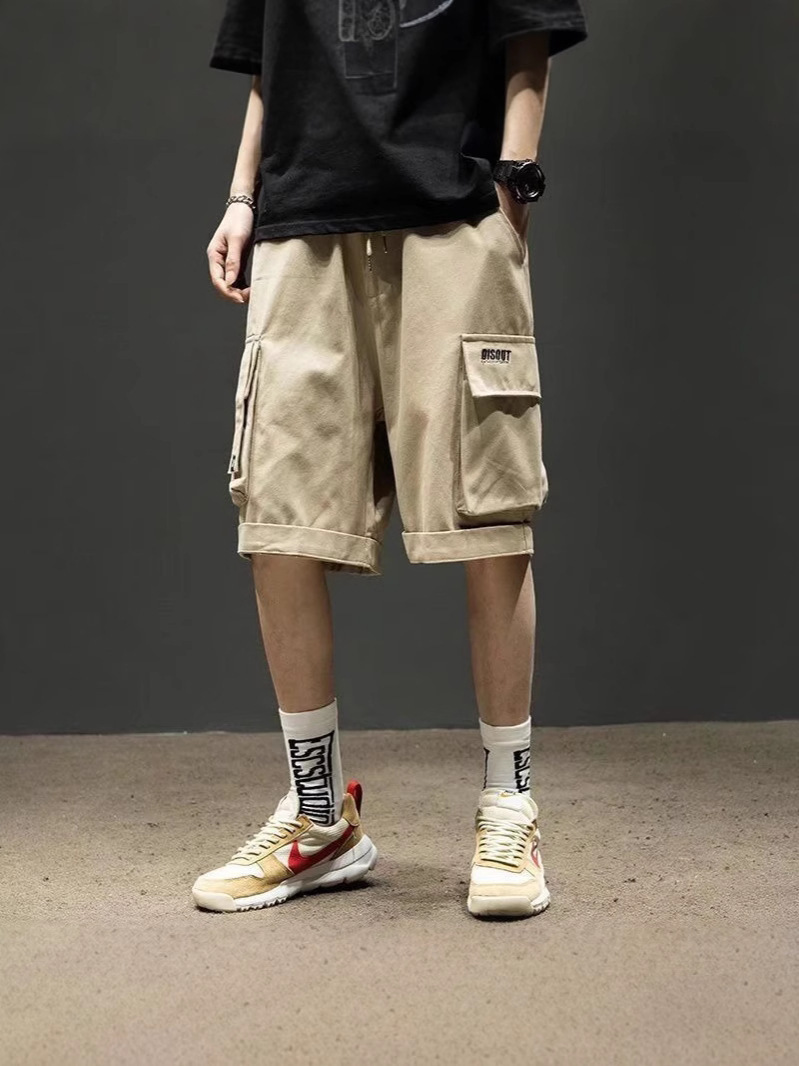 Nuevos pantalones cortos de herramientas de moda para hombres, pantalones de moda japoneses de verano, pantalones de cinco puntos sueltos de gran tamaño para hombres
