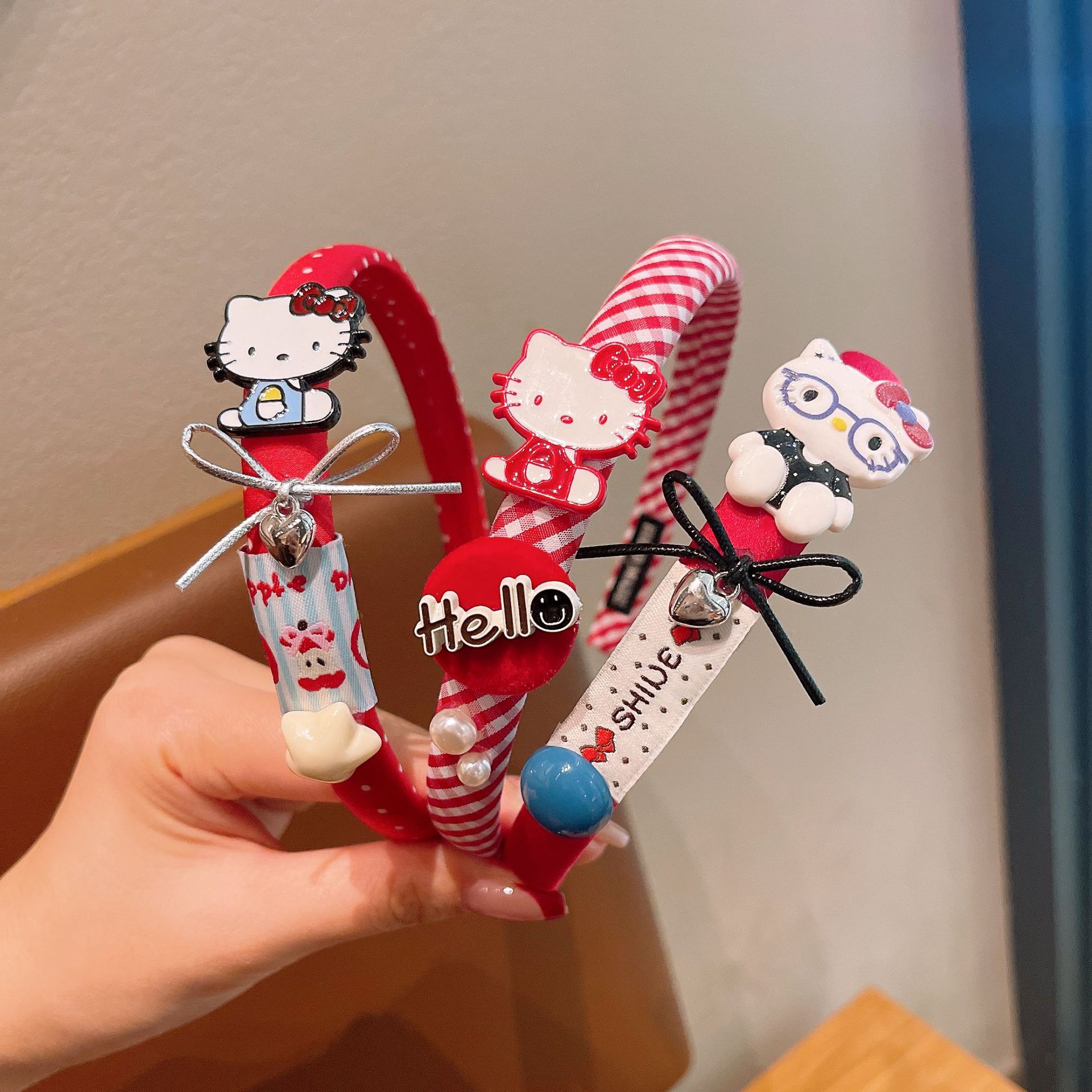 Nuevos niños al por mayor esponja banda de cabello de dibujos animados KT gato arco clip de cabello no estrangulación cabeza alta cráneo bebé joyería de cabello