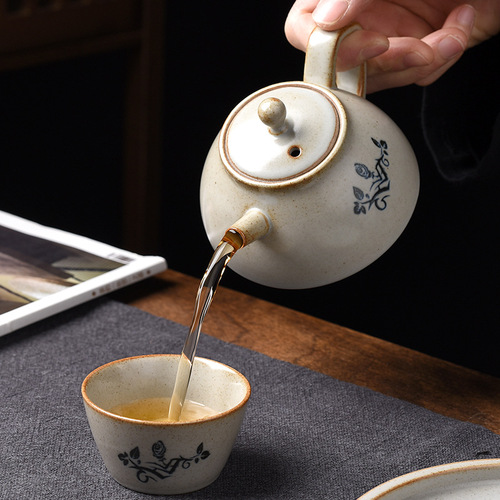 Grass and wood ash creative Tenghua teapot household ceramic retro teapot Kung Fu tea set divided teapot single pot lifting beam teapot