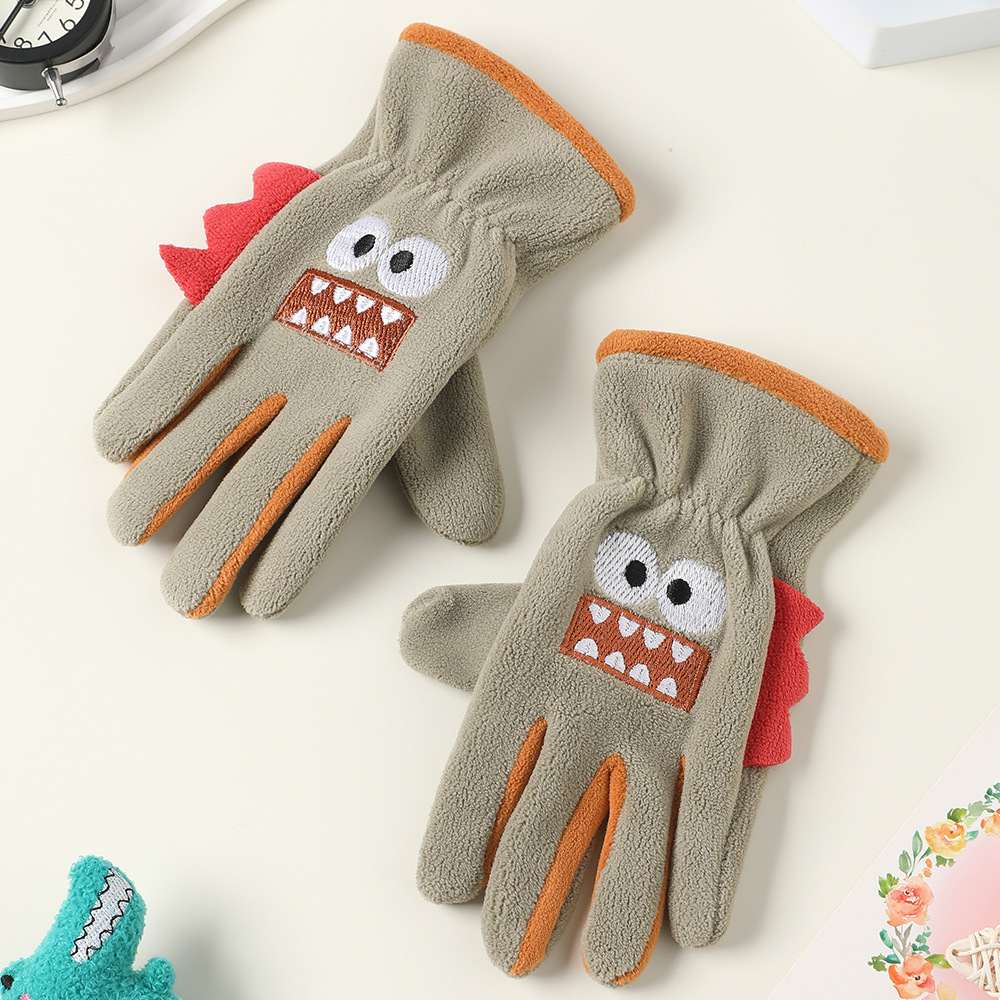Guantes de invierno para niños con guantes de terciopelo de dibujos animados al aire libre para montar a favor de la piel, guantes de terciopelo de grano para niños y niñas.