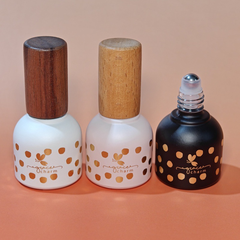 新款10ML莫兰迪烫金滚珠瓶喷雾瓶空瓶木盖可印LOGO