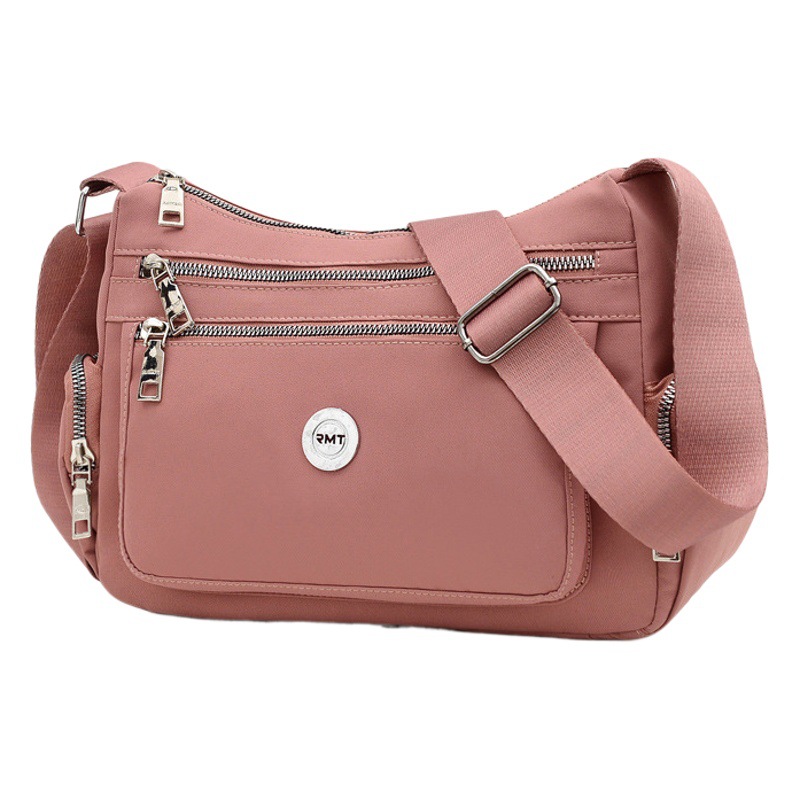 Bolsos bolsos para madres de mediana edad y ancianas 2024 nuevo bolso de mensajero de un solo hombro de tela de nailon bolso de bola de masa casual de viaje bolso de mujer