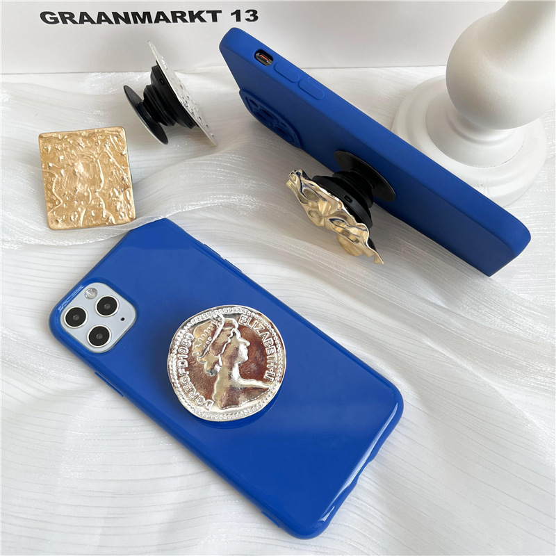 Retro estilo frío metal airbag soporte perezoso soporte de escritorio pegatina retráctil plegable cojín de aire soporte del teléfono móvil