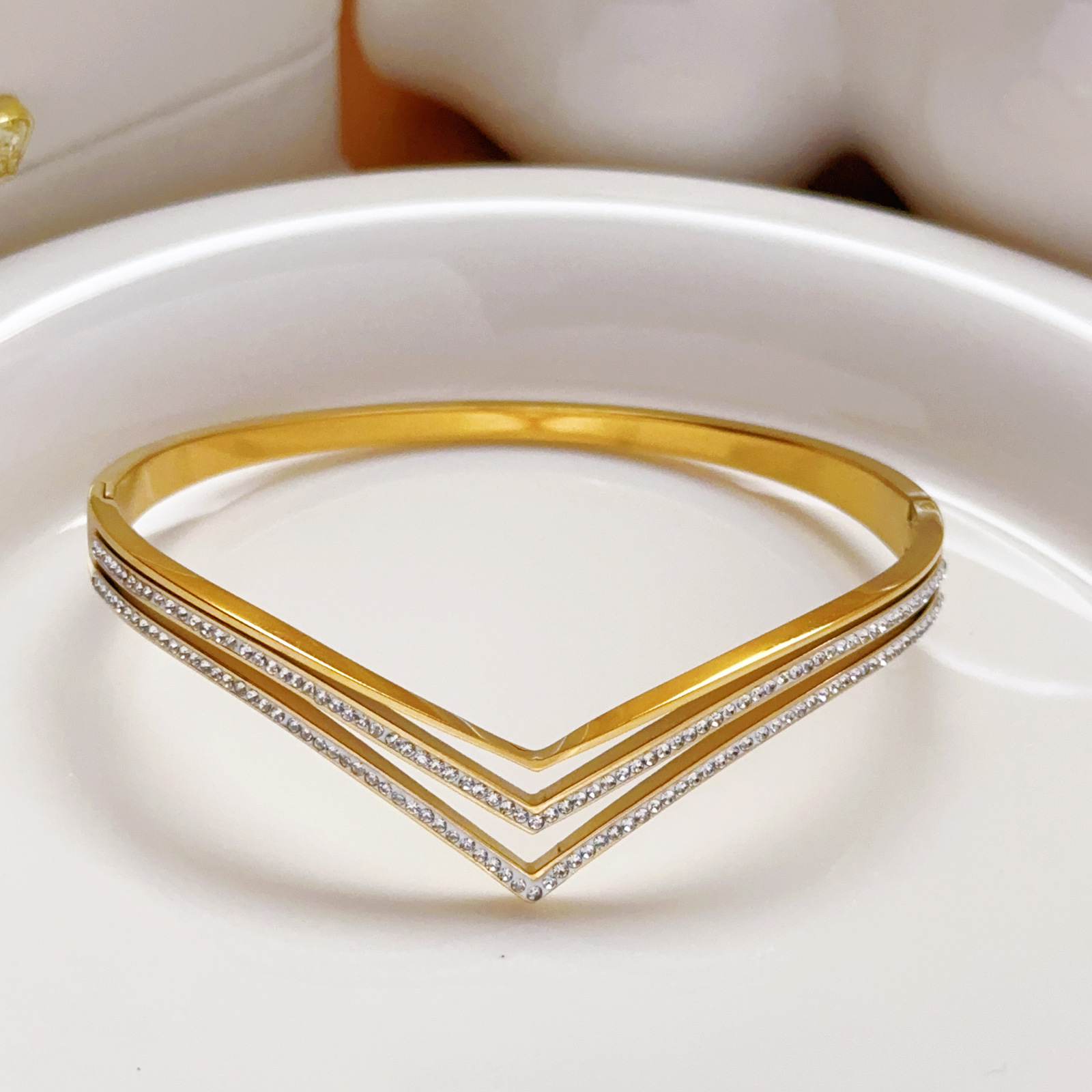 Europa y América pulsera de acero de titanio simple tres filas de diamantes de explosión transfronteriza de moda abertura de pulsera de acero inoxidable
