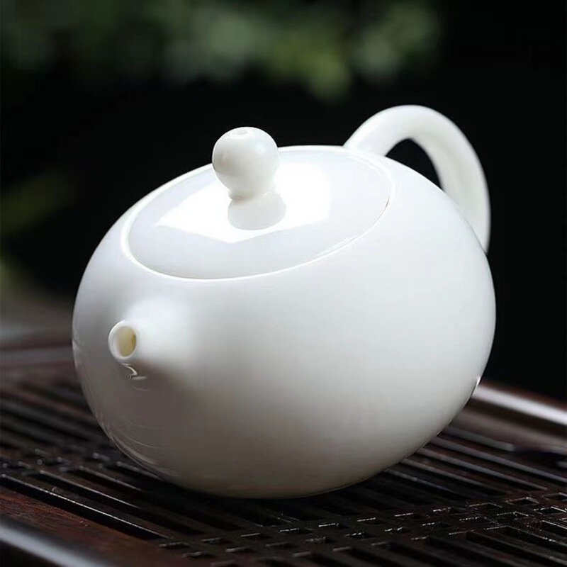 Dehua White Porcelain Xishi Teapot for Home Use, Ceramic Kung Fu Tea Set with Filter, Simple Design, Jade-Like Teapot Dehua White Porcelain Xishi Teapot for Home Use, Ceramic Kung Fu Tea Set with Filter, Simple Design, Jade-Like Teapot