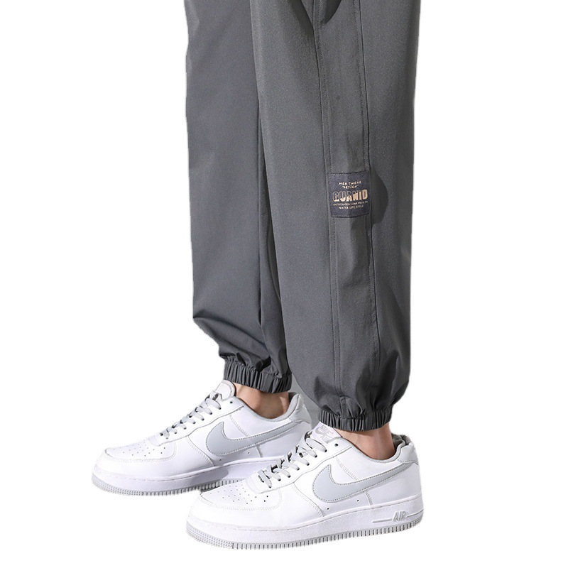 Otoño y primavera de verano de tendencia suelta pantalones casuales de pies de hielo pantalones de hombre nueve pantalones fuente de fabricación